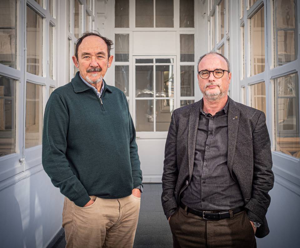 Dr. Angel Chamorro (izquierda) y Carlos Lurigados