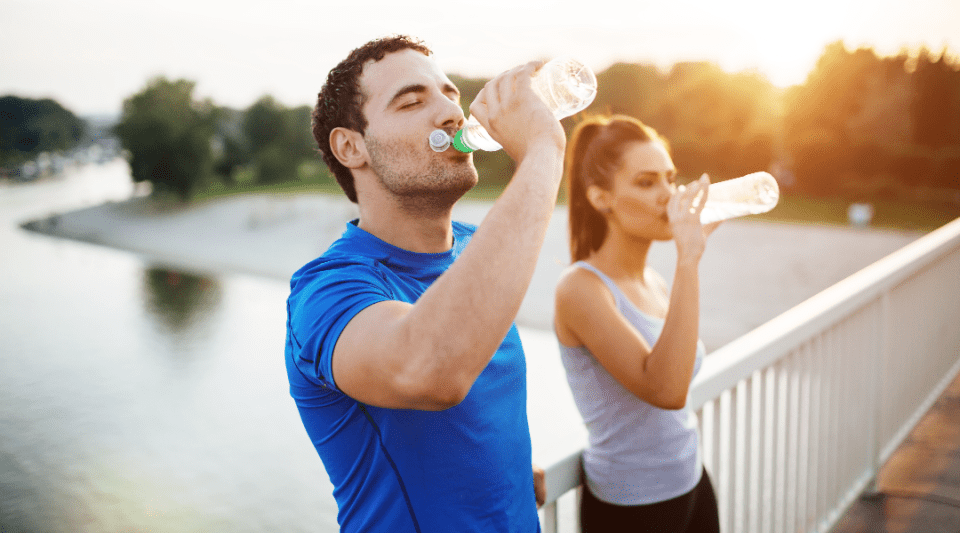 dehydrated person drinking water